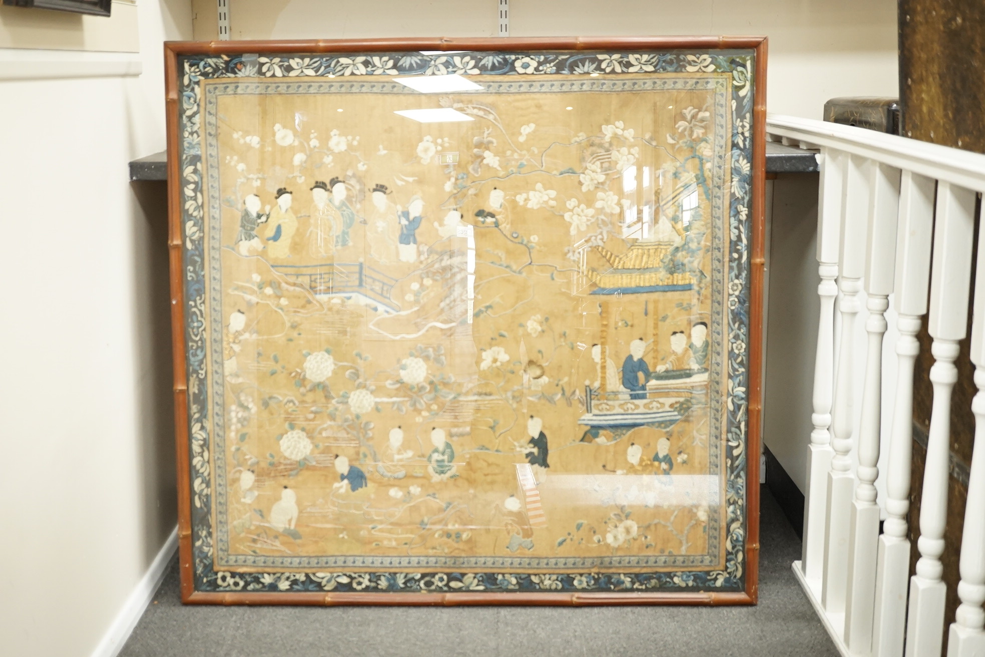 A large Chinese embroidered silk 'boys' panel, 19th century
